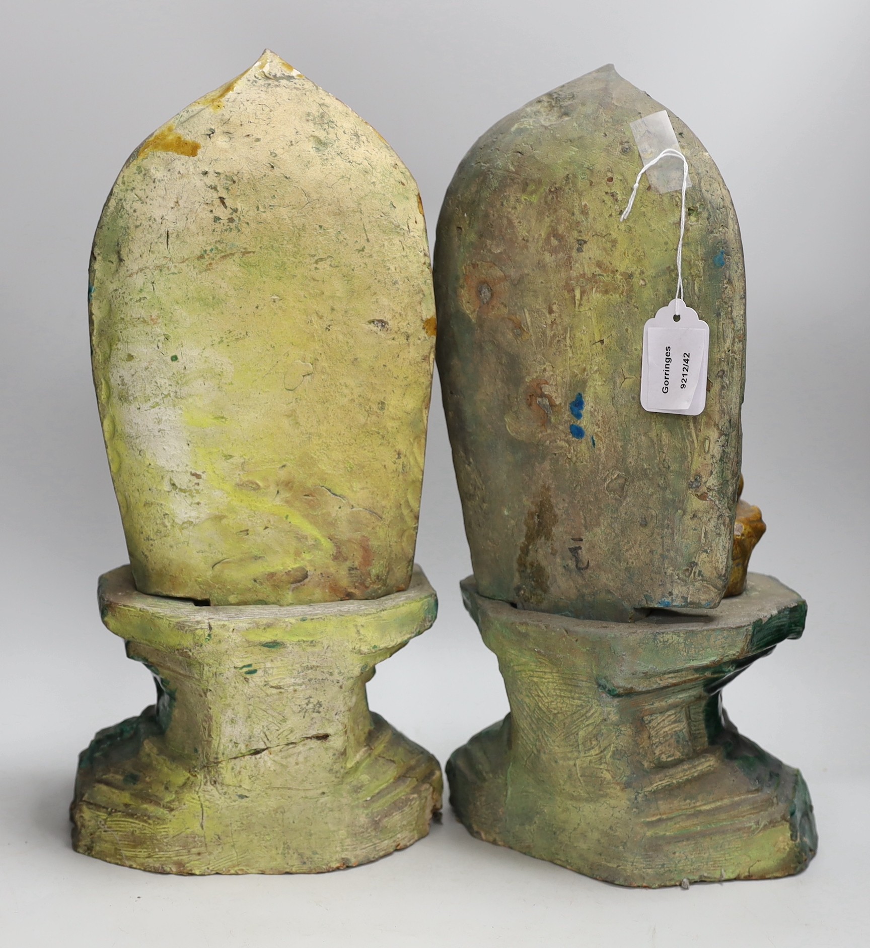 A pair of Chinese sancai glazed Buddha figures on shrines. 43cm tall